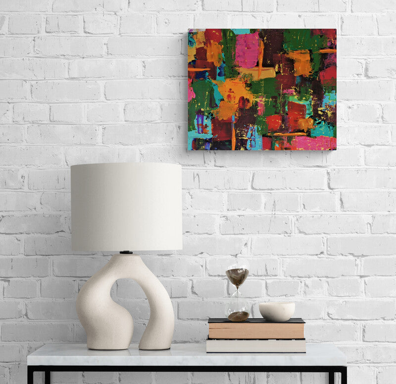 "Tito" by Lenon B hung on the wall, adding vibrancy to the decor.