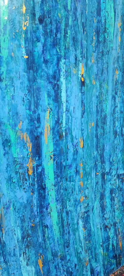 Enhance your space with Lagon, an abstract artwork by Lenon B, featuring deep blues and glimmers of gold for a serene vibe.