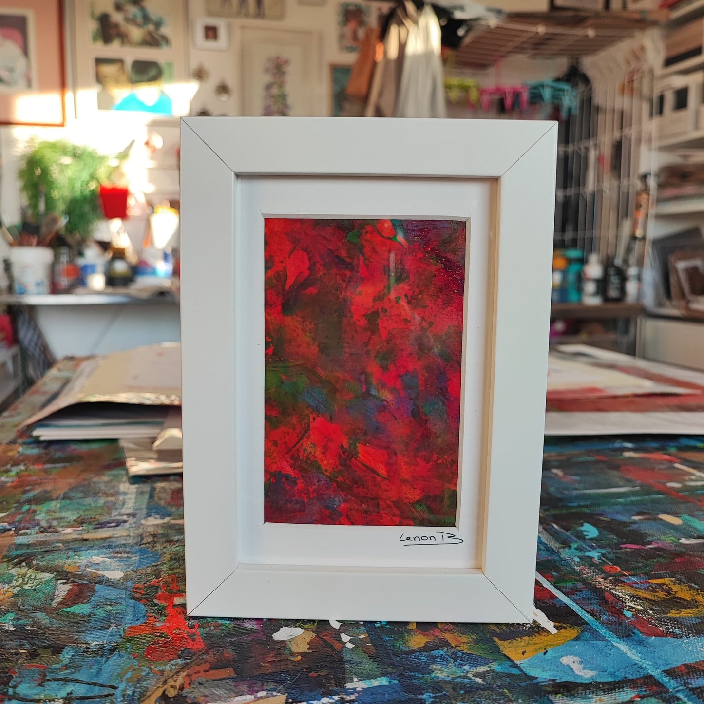 Powerful red and orange abstract painting by Lenon B, perfect for modern decor.