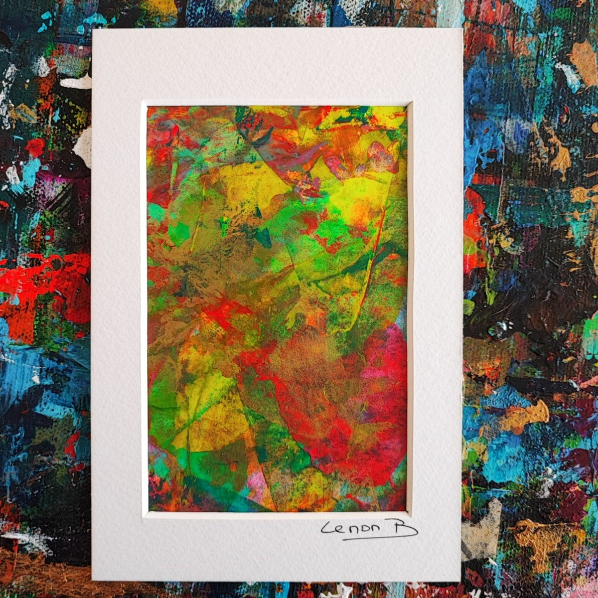 Vibrant abstract painting featuring green, yellow, and red hues by Lenon B, adding energy to any space.